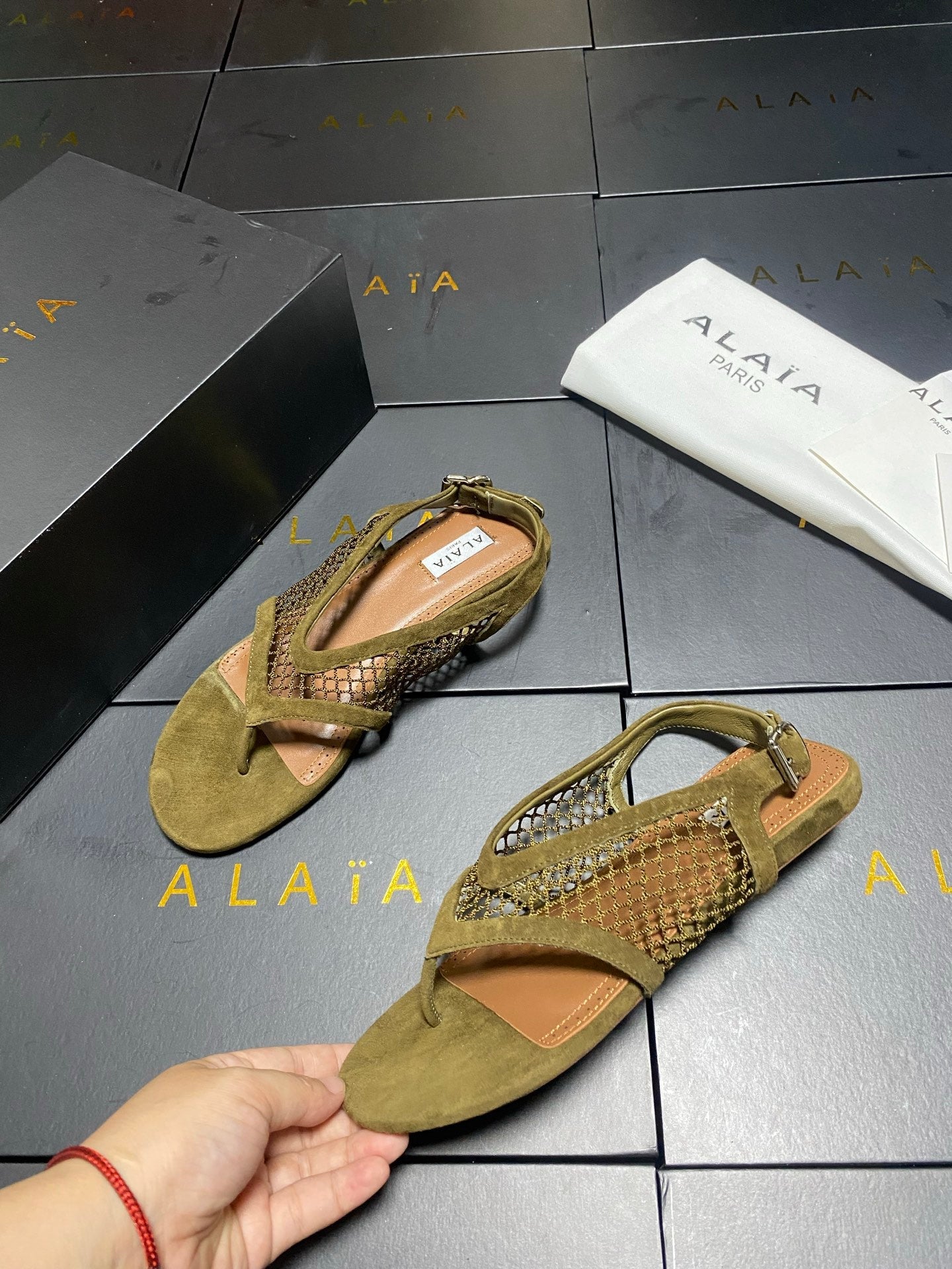 ALAIA 26S FLAT MESH THONG SANDALS MM IN MOSS GREEN SUEDE