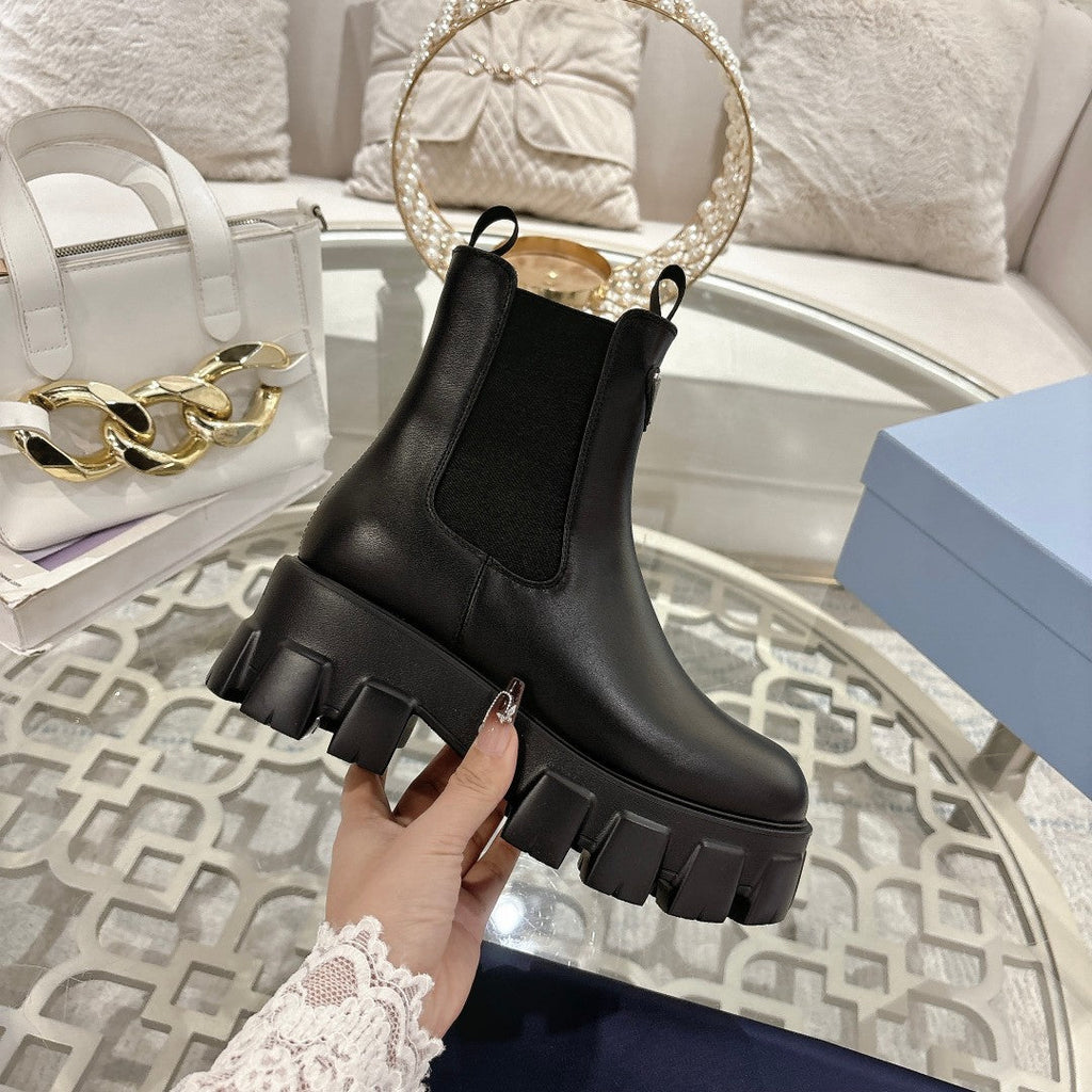 PRADA 26S MONOLITH CHELSEA BOOTS IN BLACK SHINY CALFSKIN AND FABRIC