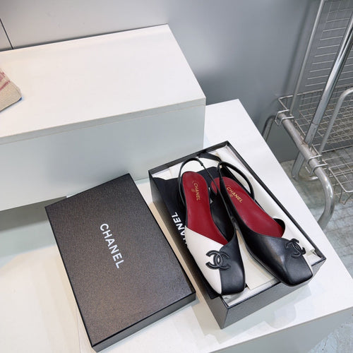 26S FLAT SLINGBACK IN BLACK AND WHITE LAMBSKIN