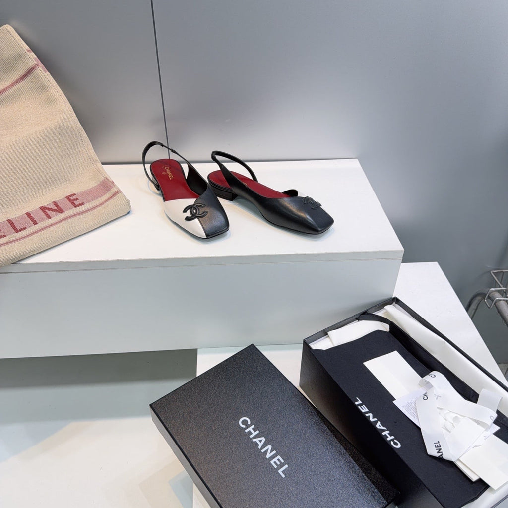 26S FLAT SLINGBACK IN BLACK AND WHITE LAMBSKIN