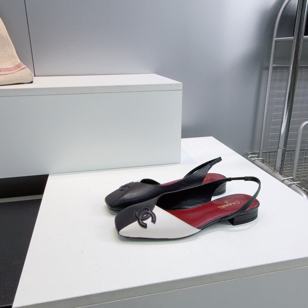 26S FLAT SLINGBACK IN BLACK AND WHITE LAMBSKIN