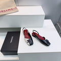 26S FLAT SLINGBACK IN BLACK AND WHITE LAMBSKIN