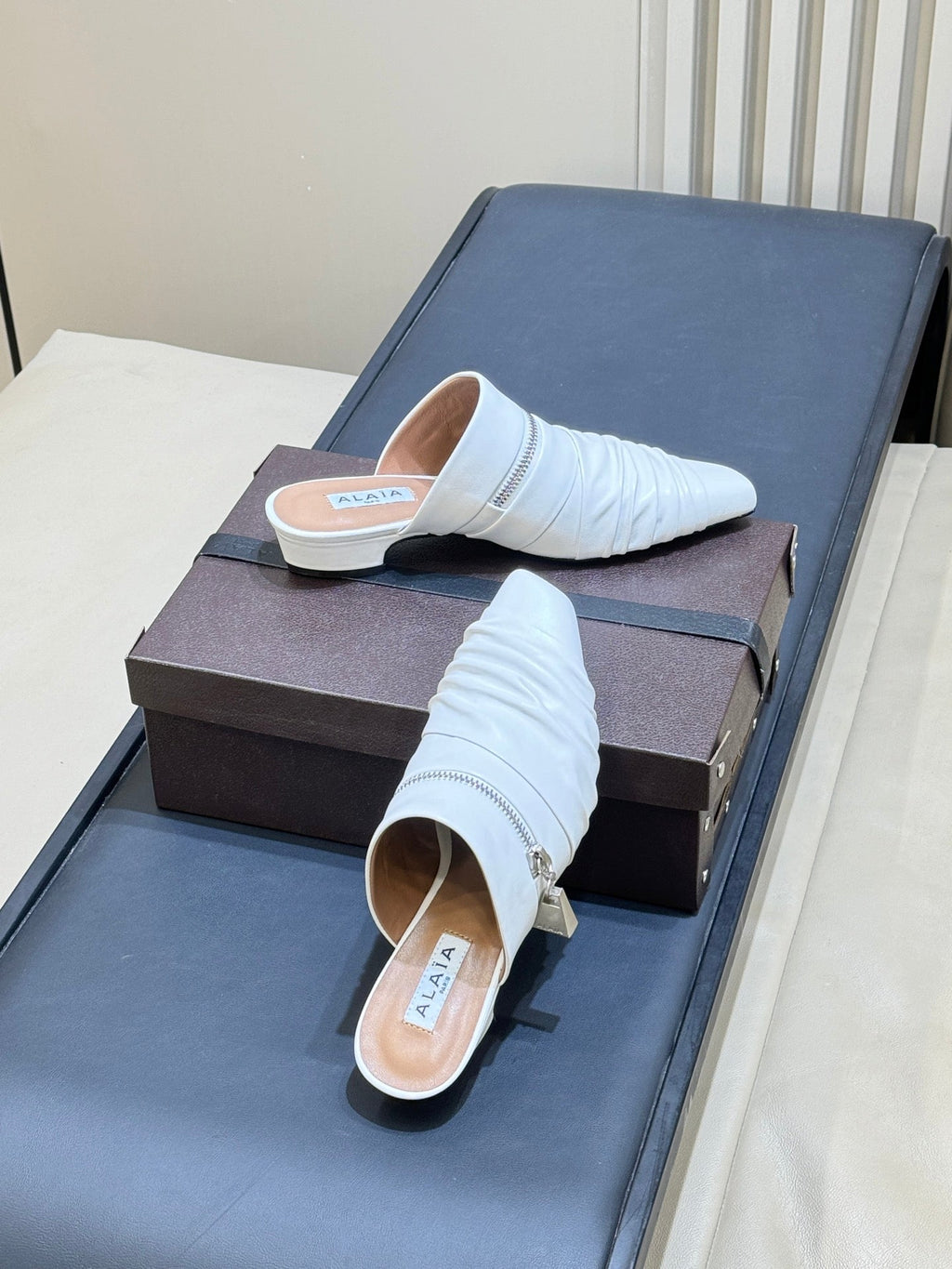 ALAIA 26S PLEATED MULES IN WHITE LAMBSKIN