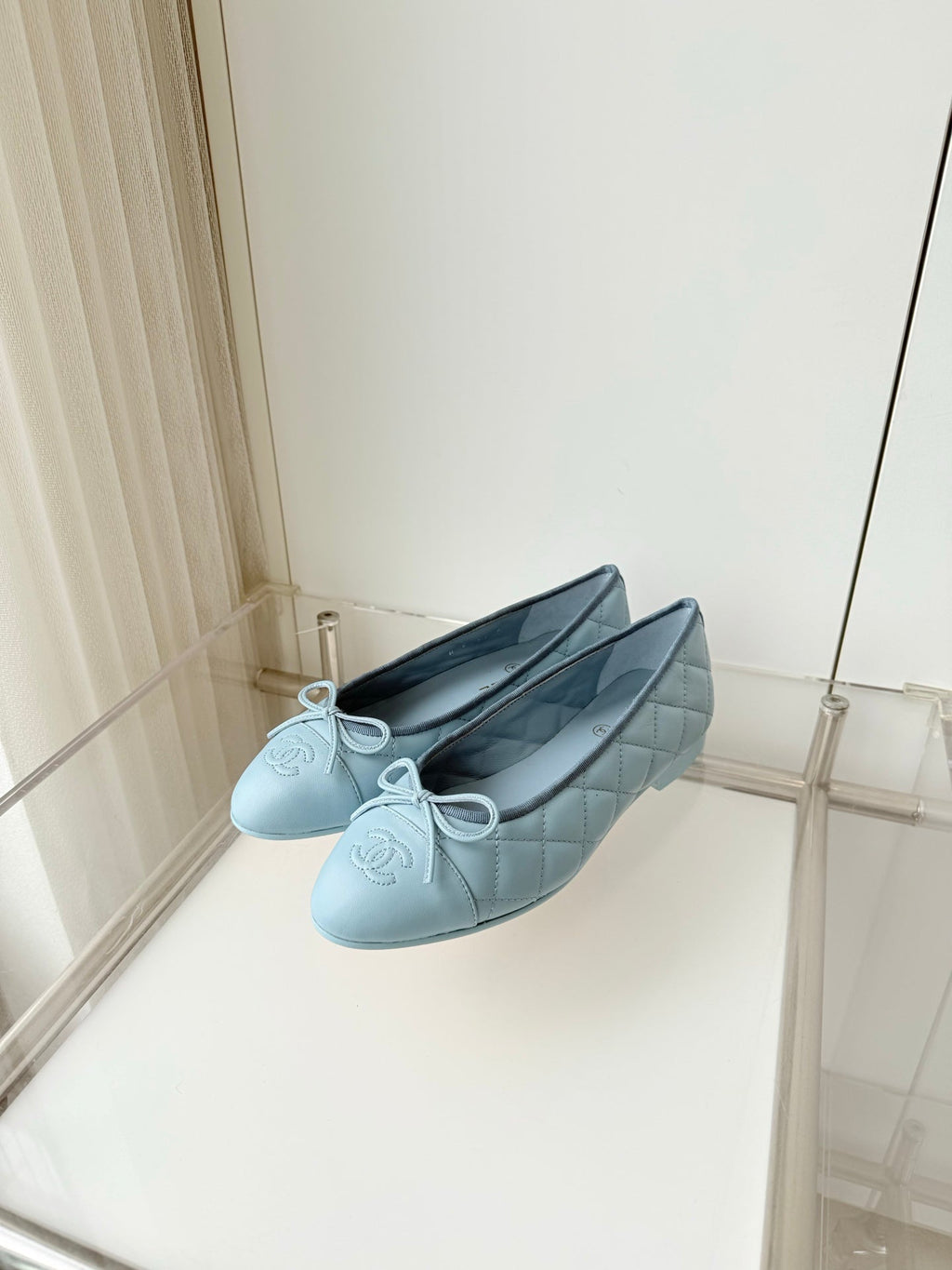 CHANEL 26S BALLET FLATS IN LIGHT BLUE QUILTED CALFSKIN WITH BOW