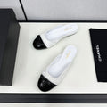 BOW MULE IN WHITE FABRIC AND BLACK CALFSKIN