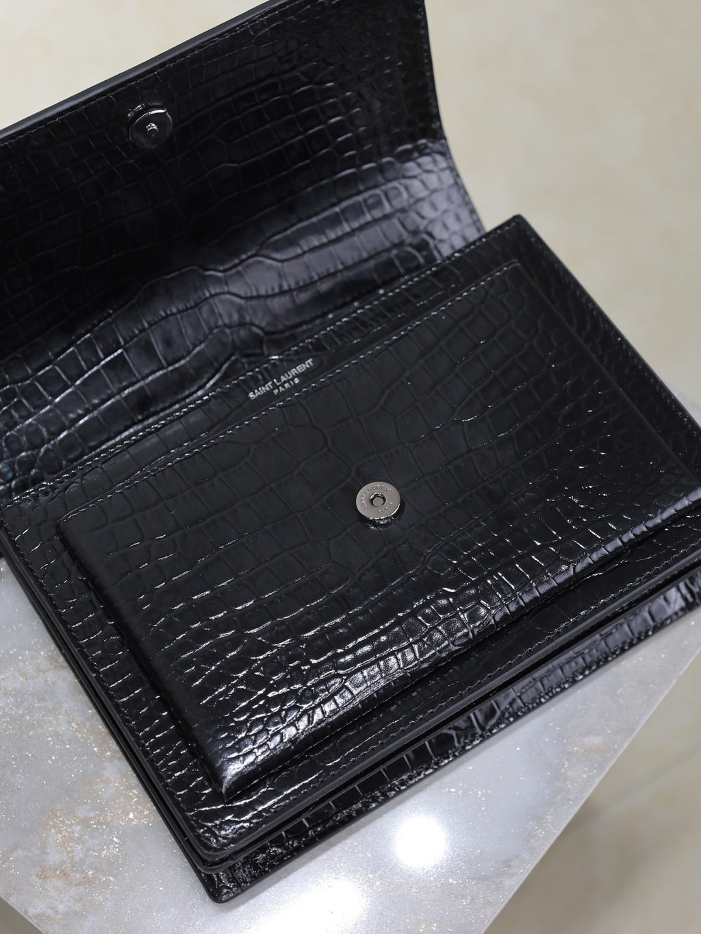 YSL 25S SUNSET MEDIUM 22 IN BLACK CROCODILE-EMBOSSED SHINY CALFSKIN BLACK HARDWARE