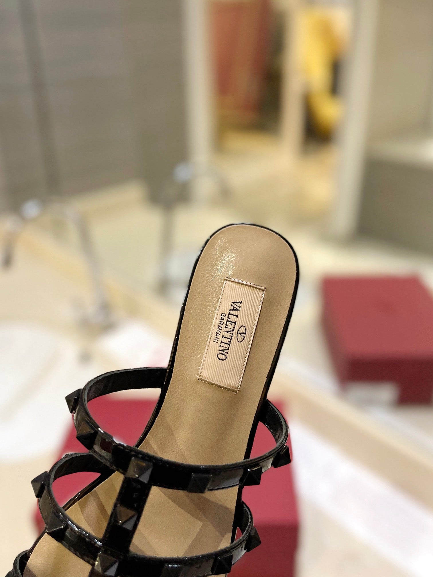 VALENTINO 26S ROCKSTUD CAGED SANDALS IN BLACK PATENT CALFSKIN