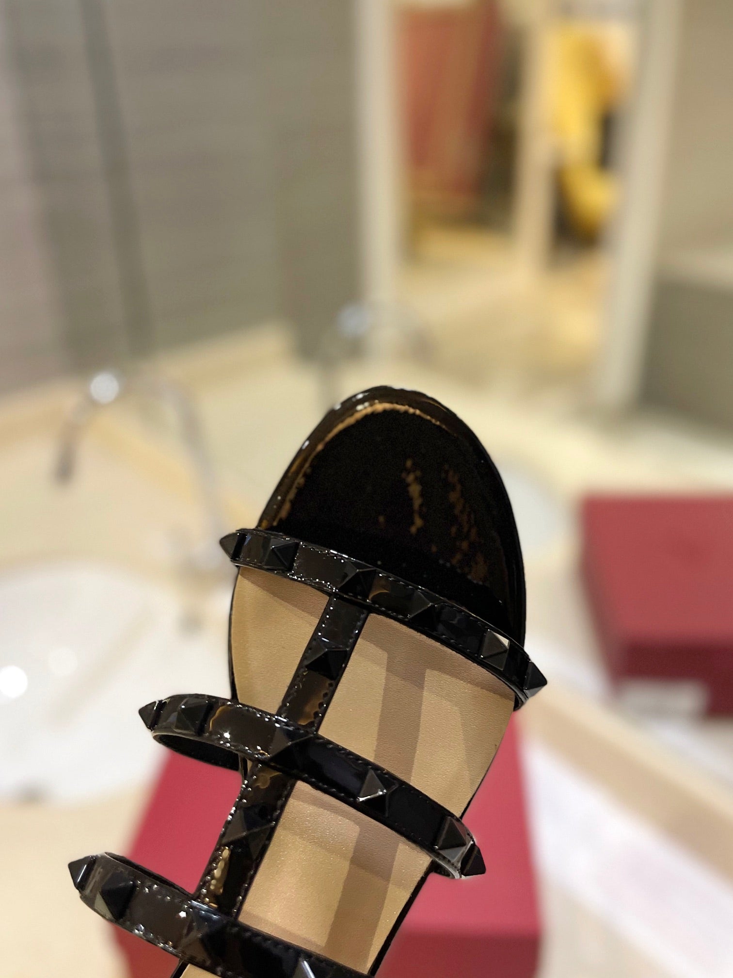 VALENTINO 26S ROCKSTUD CAGED SANDALS IN BLACK PATENT CALFSKIN