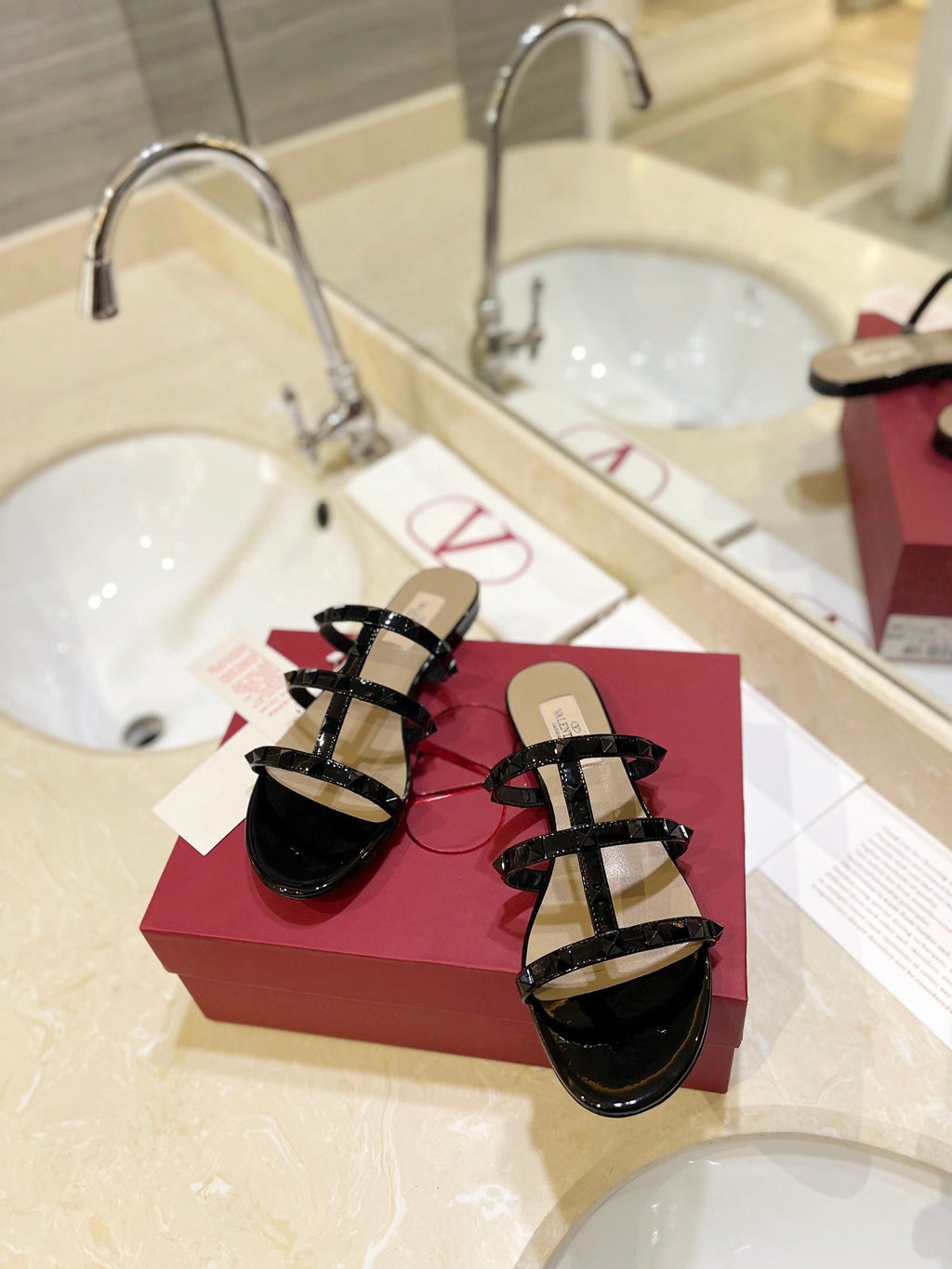 VALENTINO 26S ROCKSTUD CAGED SANDALS IN BLACK PATENT CALFSKIN