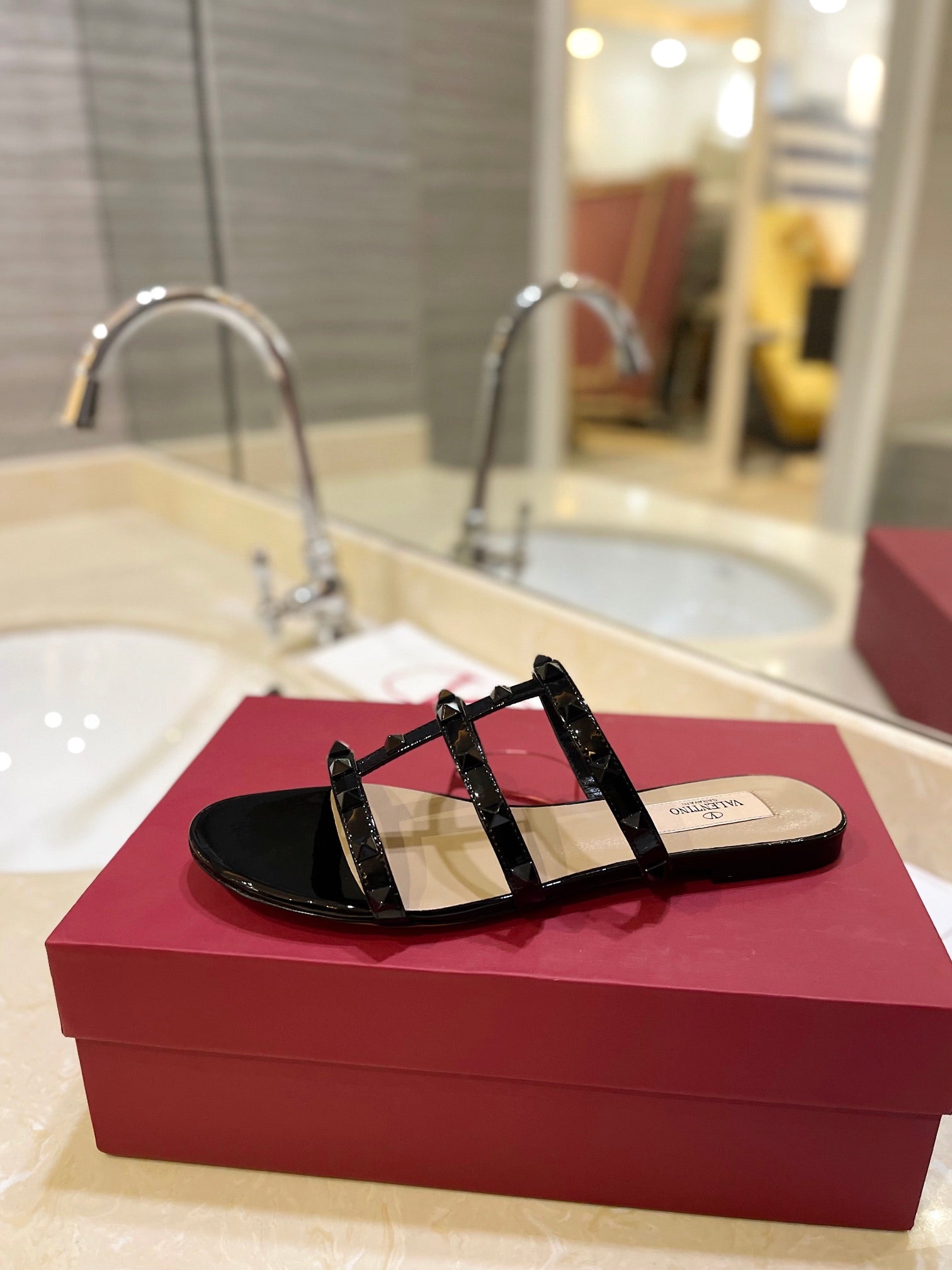 VALENTINO 26S ROCKSTUD CAGED SANDALS IN BLACK PATENT CALFSKIN