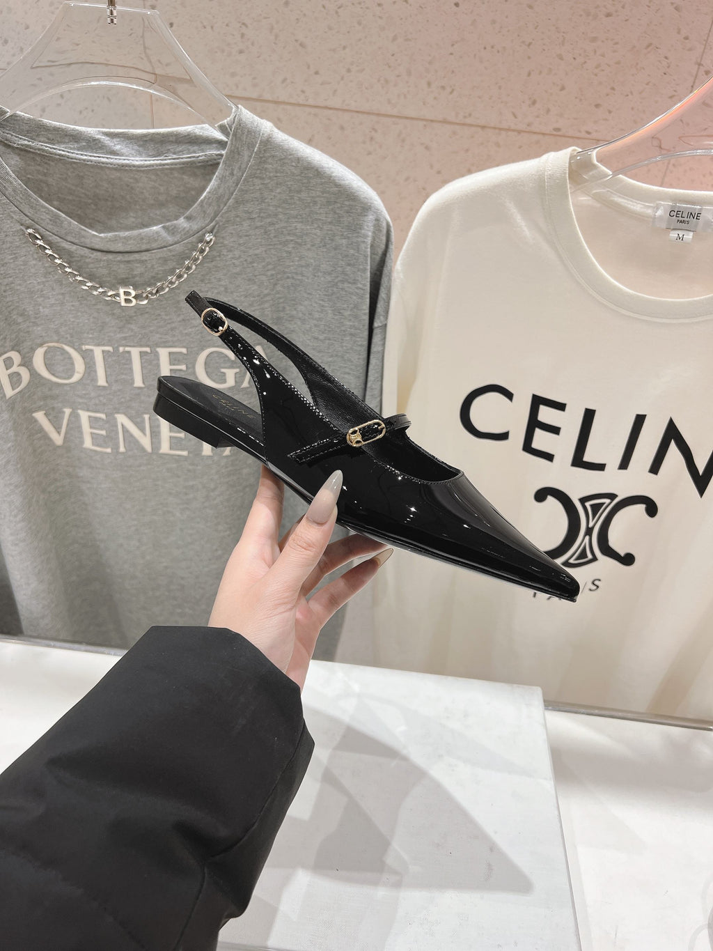 JUDY FLAT SLINGBACK IN BLACK PATENT CALFSKIN