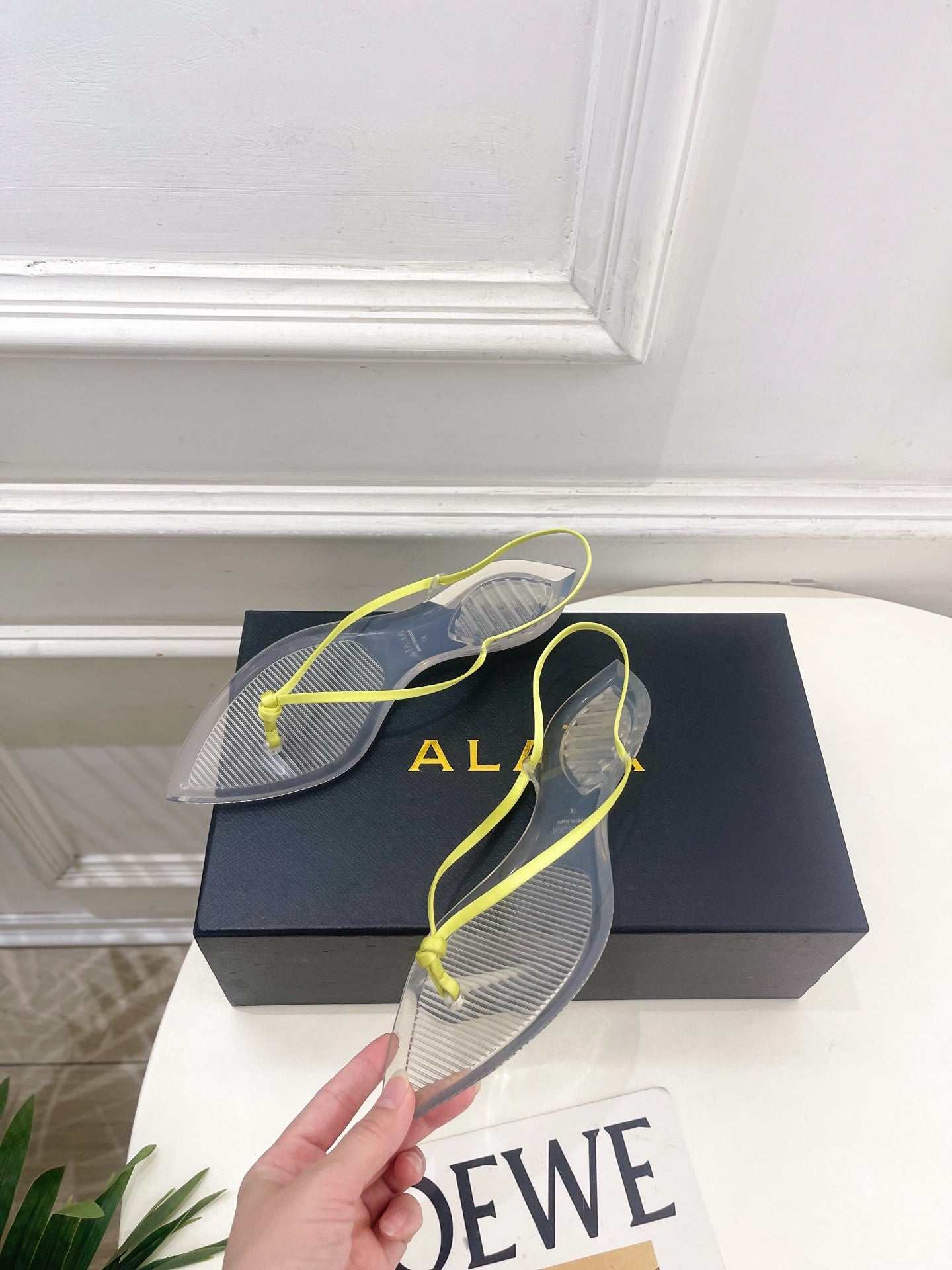 ALAIA 26S POINTED-TOE THONG SANDALS IN LIGHT YELLOW SATIN AND TRANSPARENT PVC