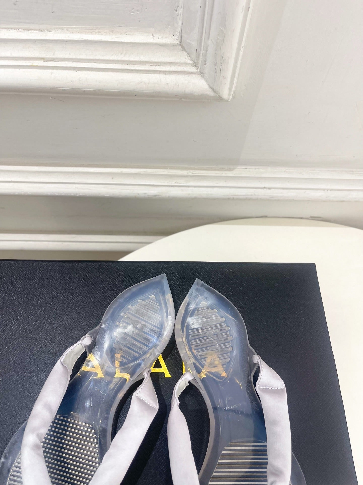 ALAIA 26S THONG SANDALS IN PEARL GREY SATIN AND TRANSPARENT PVC