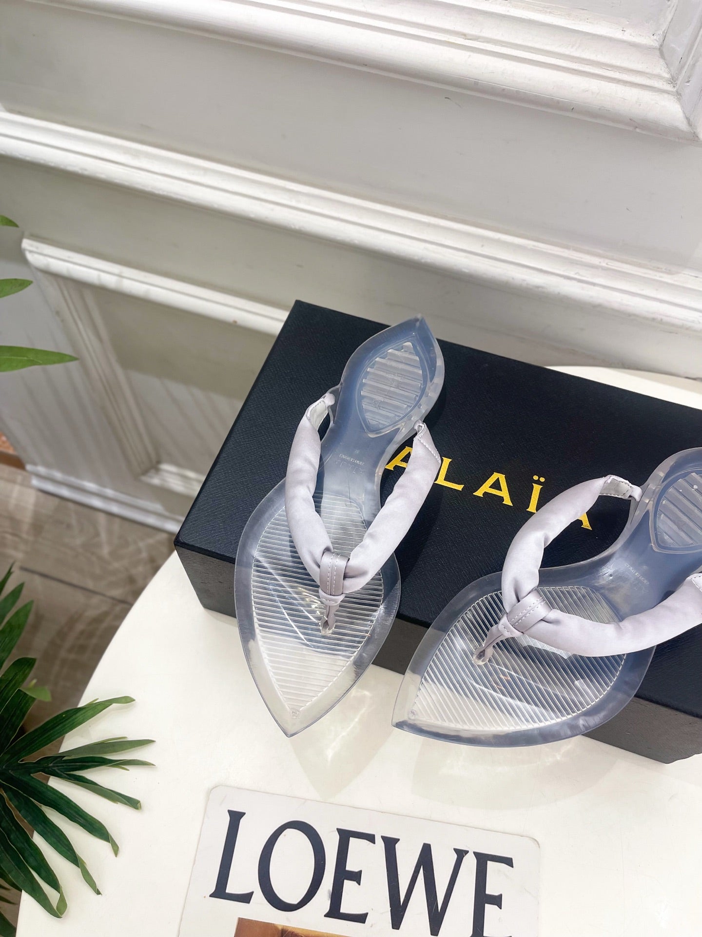ALAIA 26S THONG SANDALS IN PEARL GREY SATIN AND TRANSPARENT PVC