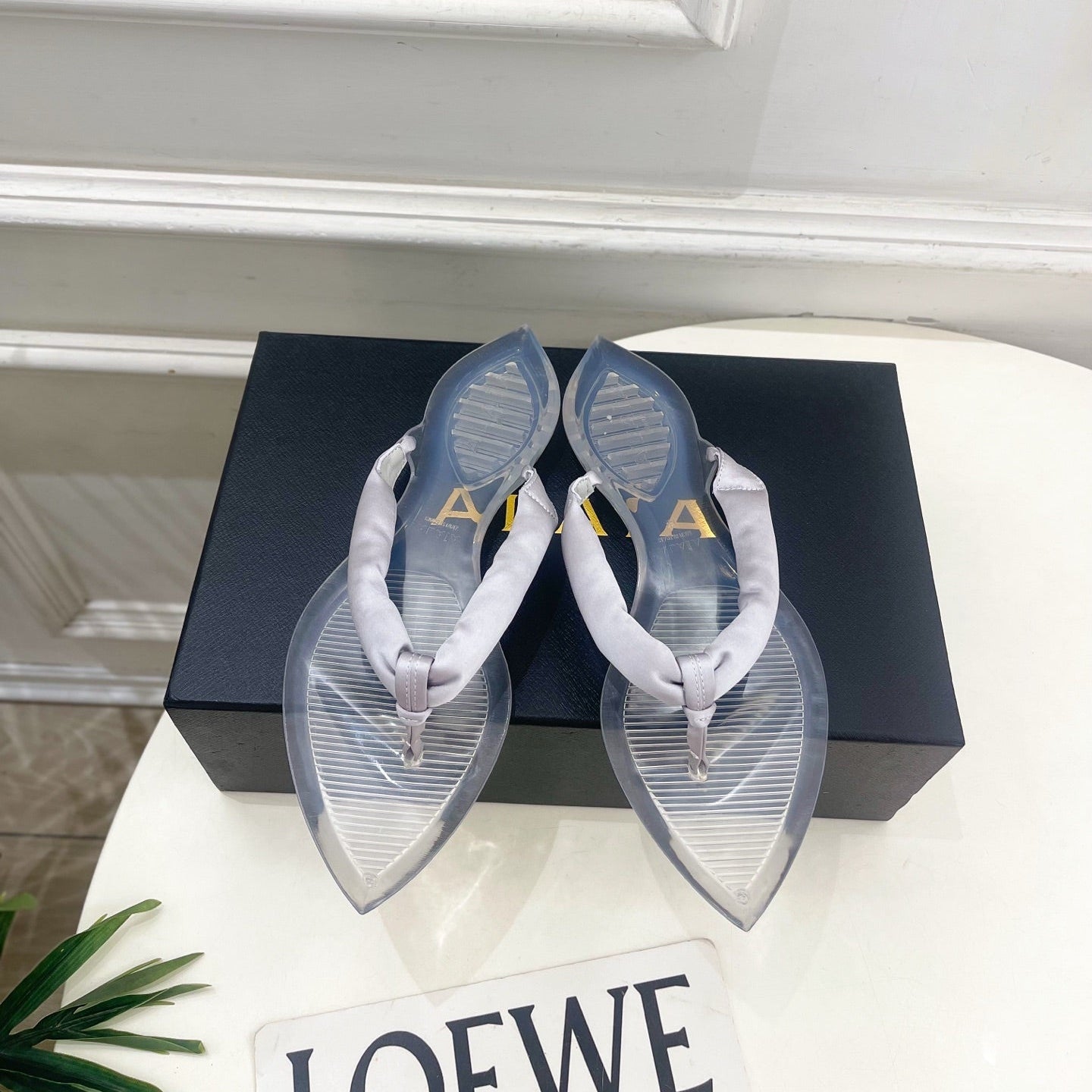 ALAIA 26S THONG SANDALS IN PEARL GREY SATIN AND TRANSPARENT PVC