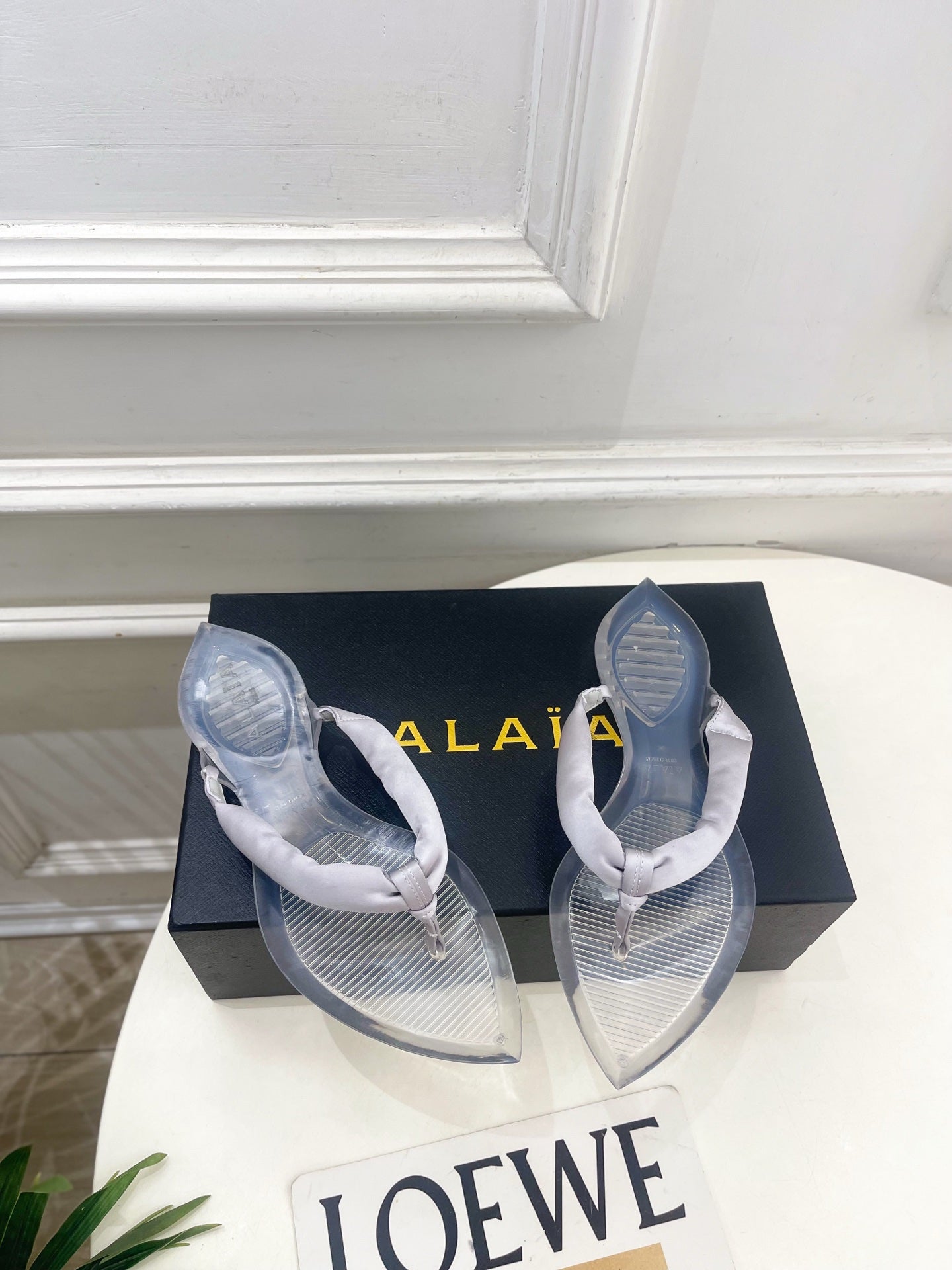 ALAIA 26S THONG SANDALS IN PEARL GREY SATIN AND TRANSPARENT PVC