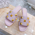 STUD FLAT SLIDE IN BABY PINK LAMBSKIN
